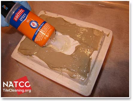 applying adhesive to soap dish