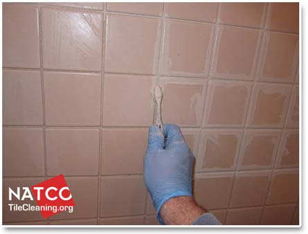 applying colorsealer to shower grout