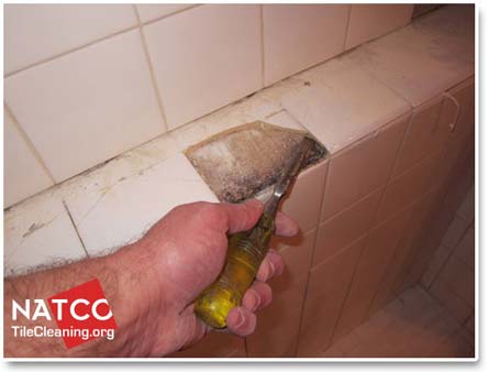 removing cracked shower tile